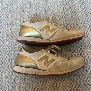 New Balance Cream and Gold Athletic Shoes